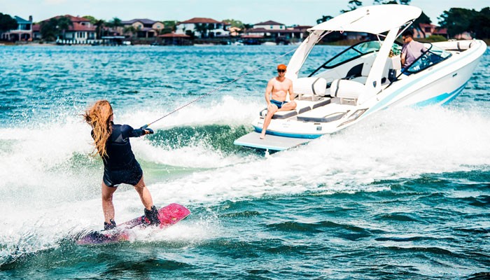 How to wakeboard behind a boat 
